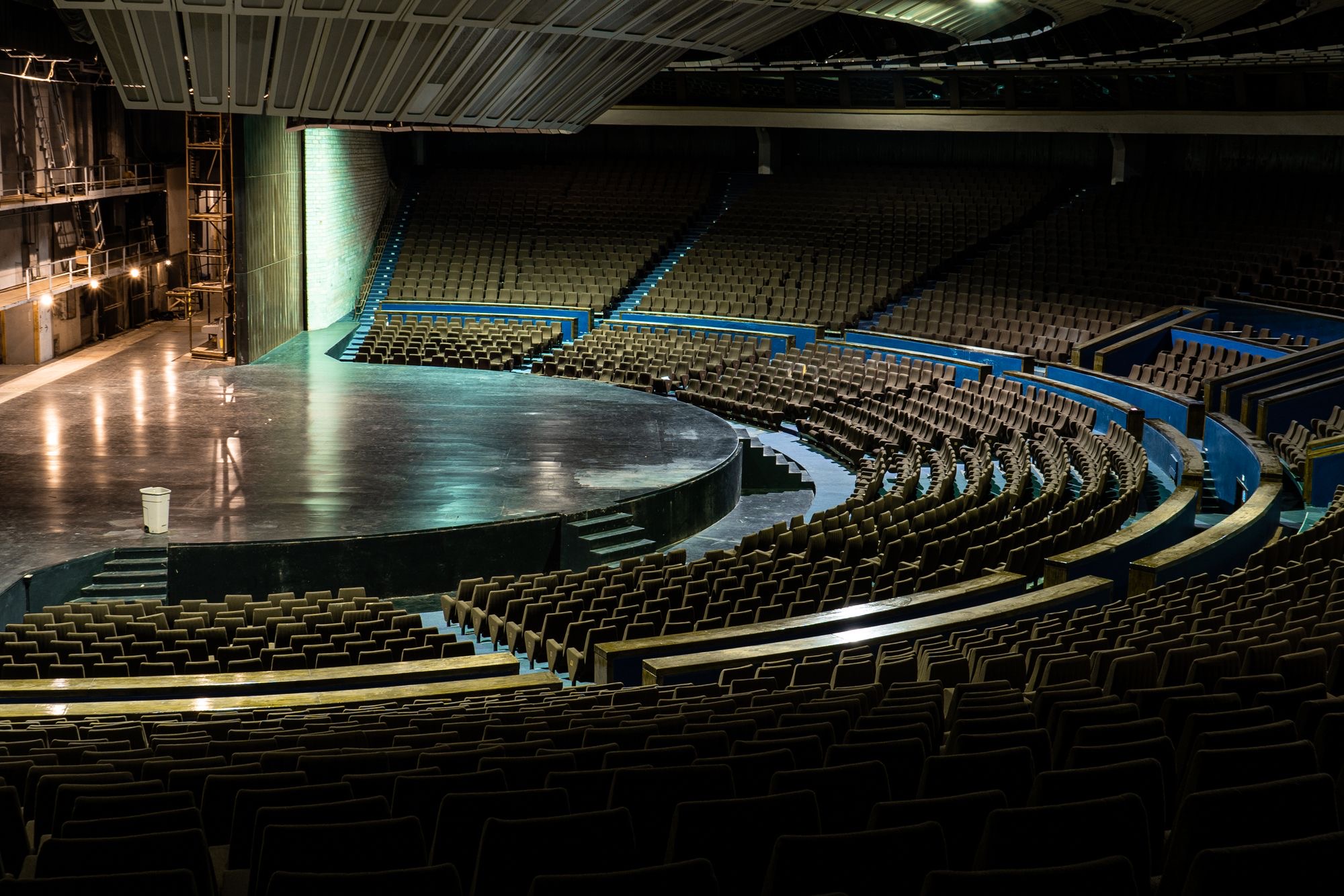 Empty auditorium stage in dramatic light